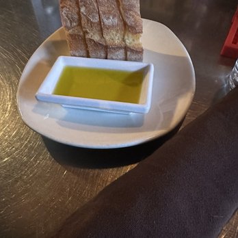 Belotti Ristorante E Bottega - Bread and olive oil served when you sit/ after ordering - Italian Near Me - Oakland, California Belotti Ristorante E Bottega - Bread and olive oil served when you sit/ after ordering - Italian Near Me - Oakland, California