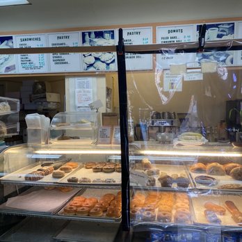 Happy Donut - a display case filled with donuts - Donuts Near Me - San Francisco, California Happy Donut - a display case filled with donuts - Donuts Near Me - San Francisco, California