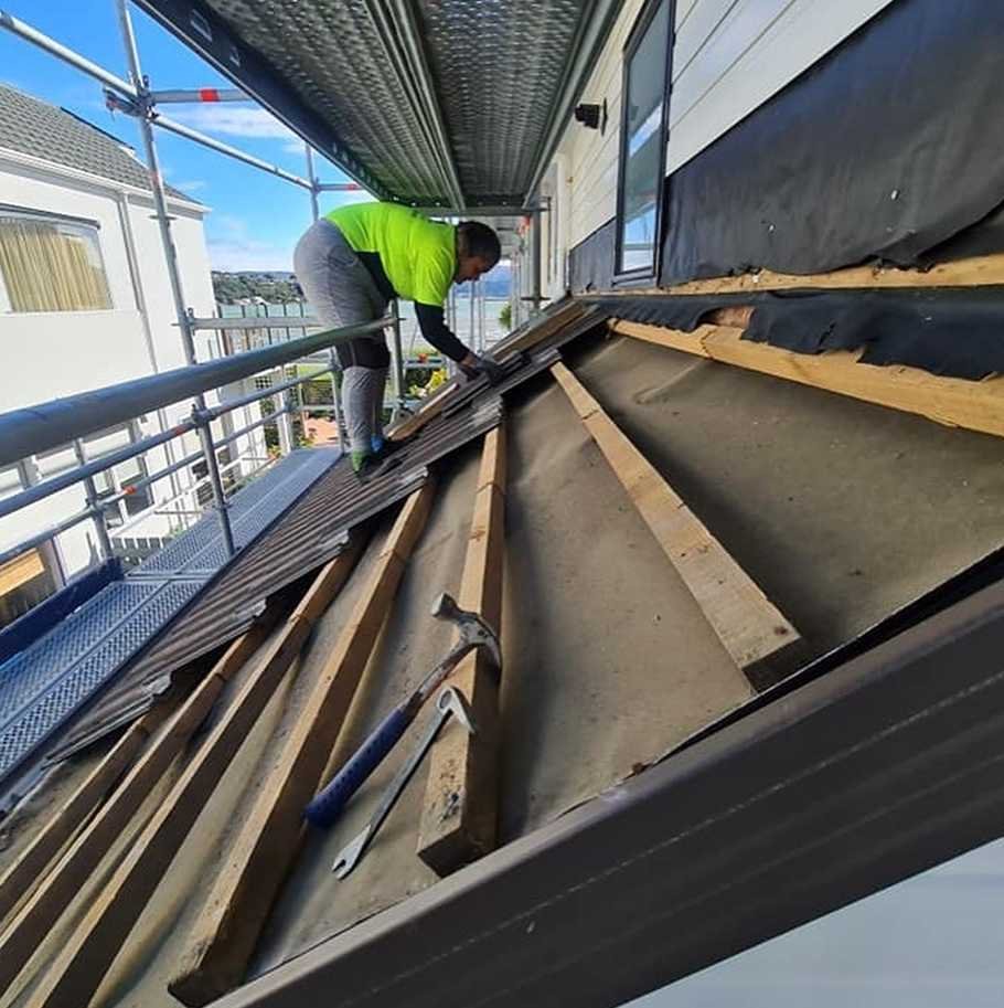 Slide of Liberty City Roofing