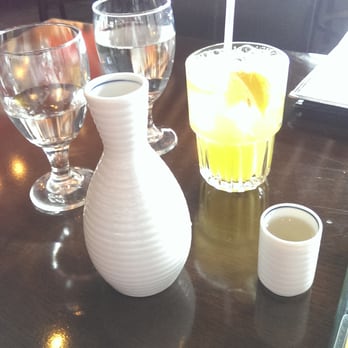 Origami Tiger - Hot Sake (large size on the Happy Hour menu) and a Honey Green Tea (honey bourbon, green tea) - Sushi Bars Near Me - Minneapolis, Minnesota Origami Tiger - Hot Sake (large size on the Happy Hour menu) and a Honey Green Tea (honey bourbon, green tea) - Sushi Bars Near Me - Minneapolis, Minnesota