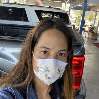Encinitas Ford - Tina - in front of the truck , practicing safety precautions with covid . - Car Dealers Near Me - Encinitas, California