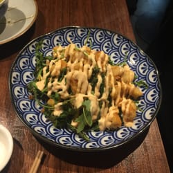 Mr Huang Jin - Spicy-fried squid. It comes on a bed of some kind of tasty leafy green (that might be arugula but who can remember?)