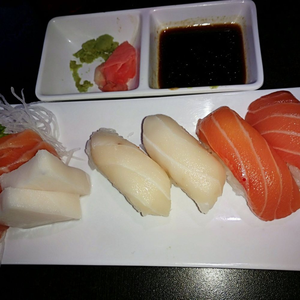 Ginza - White tuna and salmon sashimi on left. White tuna and salmon nigiri sushi on right - Sushi Bars Near Me - Sarasota, Florida Ginza - White tuna and salmon sashimi on left. White tuna and salmon nigiri sushi on right - Sushi Bars Near Me - Sarasota, Florida
