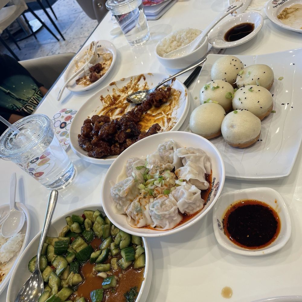 Super Dumpling - Cucumber Salad 小黄瓜Orange Chicken 橙皮鸡Beef Pan-Fried Dumplings 牛肉大葱煎饺Spicy Chicken Wontons 红油鸡肉抄手 - Noodles Near Me - Orange, California Super Dumpling - Cucumber Salad 小黄瓜Orange Chicken 橙皮鸡Beef Pan-Fried Dumplings 牛肉大葱煎饺Spicy Chicken Wontons 红油鸡肉抄手 - Noodles Near Me - Orange, California
