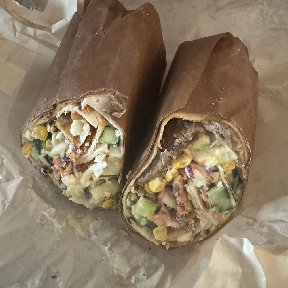 Zesty Feta Doner Zesty feta spread, pepperoncinis, romaine, cabbage, tomato, onion,All Three meats Zesty Feta Doner Zesty feta spread, pepperoncinis, romaine, cabbage, tomato, onion,All Three meats