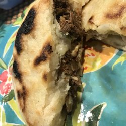 Close up of beef arepa