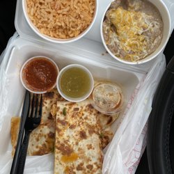 El Super Taco - Chicken Enchiladas (there were four in one order) + Rice, refried beans, and salsas.