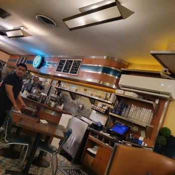 The Comfort Diner - a man standing at the counter - Diners Near Me - New York, New York The Comfort Diner - a man standing at the counter - Diners Near Me - New York, New York