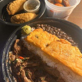 Cafe La Trova - Ropa vieja with a side of Maduros y beef empanadas - Cocktail Bars Near Me - Miami, Florida