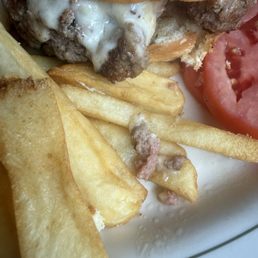 Raw meat on previously cooked fries Raw meat on previously cooked fries