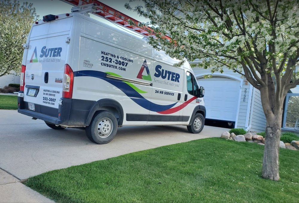 Slide of CW Suter Services