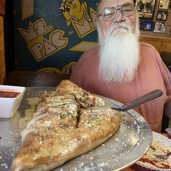 Cap's Pizza - Bomber Cheese Calzone with Two Toppings - Pizza Near Me - Vero Beach, Florida Cap's Pizza - Bomber Cheese Calzone with Two Toppings - Pizza Near Me - Vero Beach, Florida