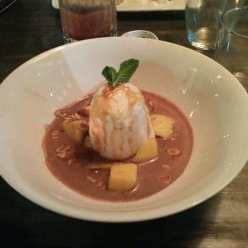 Roast And Conch - Soft meringue with chocolate soup and bananas. - Caribbean Near Me - Leeds, XWY