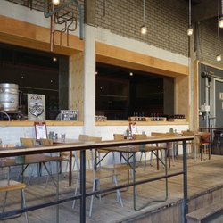 Kompaan Bier - Indoors seating area. More outside.