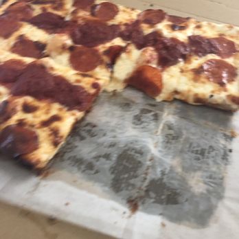 Pirogue's Whiskey Bayou - Detroit pizza with a couple pieces missing - Bars Near Me - Arabi, Louisiana Pirogue's Whiskey Bayou - Detroit pizza with a couple pieces missing - Bars Near Me - Arabi, Louisiana