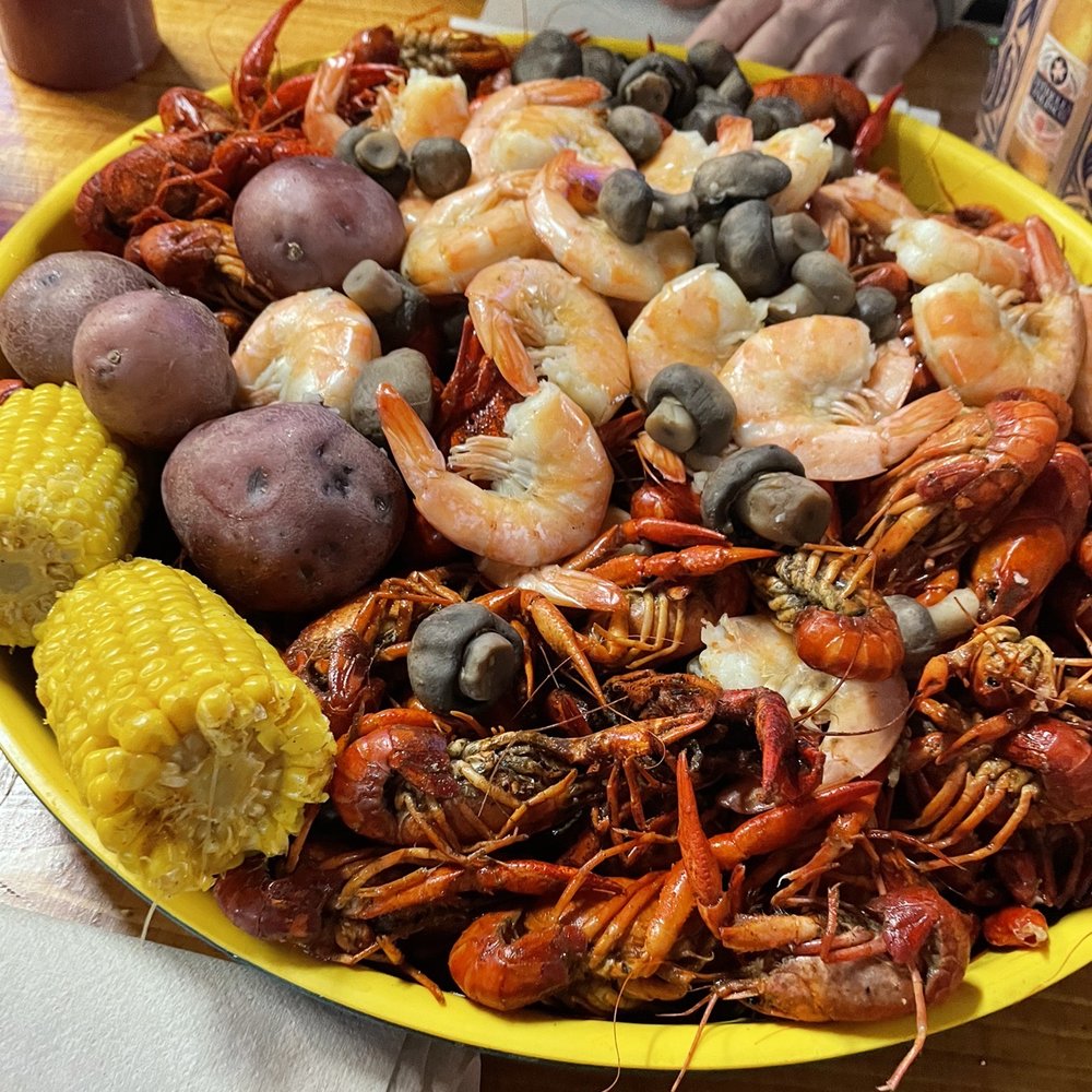 a plate of seafood and potatoes a plate of seafood and potatoes