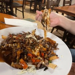 The Oasis Pub & Eatery - Philly cheese steak poutine