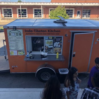 Indo-Tibetan kitchen - a group of people standing in front of a food truck - Food Trucks Near Me Indo-Tibetan kitchen - a group of people standing in front of a food truck - Food Trucks Near Me