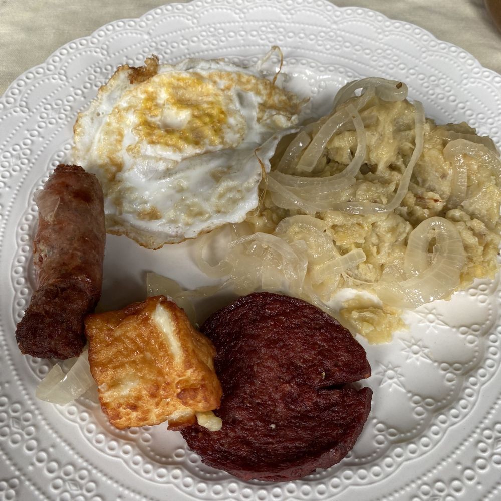 The Lunch Box - Mangú with egg, fried cheese, longaniza sausage, salchichón and onions over the plantains. - Latin American Near Me - Cranston, Rhode Island The Lunch Box - Mangú with egg, fried cheese, longaniza sausage, salchichón and onions over the plantains. - Latin American Near Me - Cranston, Rhode Island