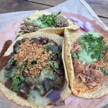 Tacos Oscar - Frijoles con puerco, chicken tinga, and chile verde tacos. All of these came with onions, which I'm a bit sensitive to, so ordered without - Tacos Near Me - Oakland, California Tacos Oscar - Frijoles con puerco, chicken tinga, and chile verde tacos. All of these came with onions, which I'm a bit sensitive to, so ordered without - Tacos Near Me - Oakland, California