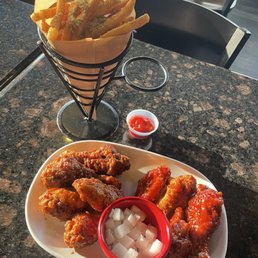 Soy garlic (left) and yangnyeom (right) wings+drumsticks and Seasoned Fries