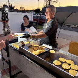 Serving up delicious tacos (Asada, Pastor, Pollo), Mulitas, quesadillas, rice, beans, grilled vegetables and all the fixings. Serving up delicious tacos (Asada, Pastor, Pollo), Mulitas, quesadillas, rice, beans, grilled vegetables and all the fixings.