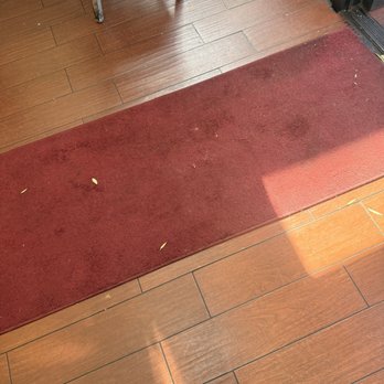 Mesopotamia Kitchen - The entrance rug - Mediterranean Near Me - San Francisco, California