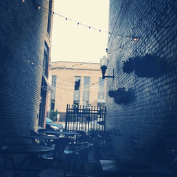 Acadia's charming little alley patio.