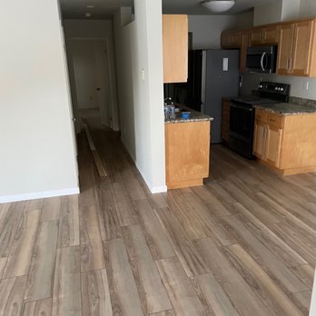Reynoza Remodeling - a kitchen and living room - General Contractors Near Me Reynoza Remodeling - a kitchen and living room - General Contractors Near Me