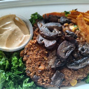Vibrant Meals - black bean burger with raised mushrooms and roasted sweet potatoes over kale. - Food Delivery Services Near Me - Nashville, Tennessee Vibrant Meals - black bean burger with raised mushrooms and roasted sweet potatoes over kale. - Food Delivery Services Near Me - Nashville, Tennessee