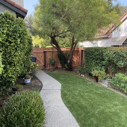 Portion of fence with beautiful new gate. Portion of fence with beautiful new gate.