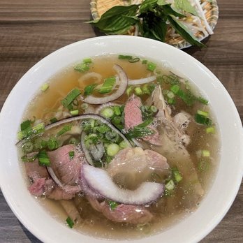 Ben Thanh - a bowl of soup with meat and vegetables - Thai Near Me - Waterloo, Ontario