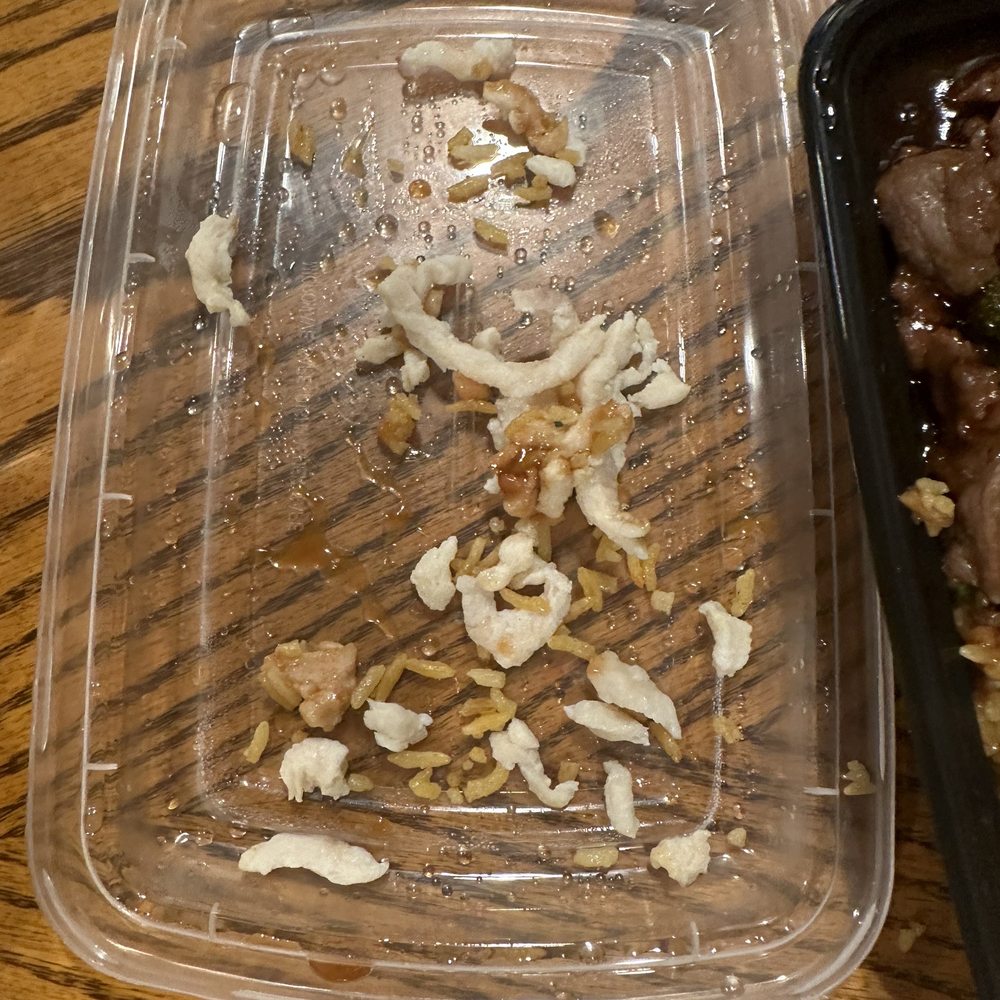 a plastic container of food a plastic container of food