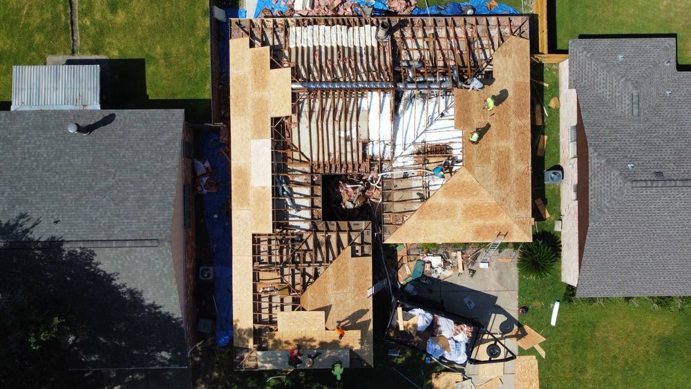 Slide of Space City Roofing & Remodeling