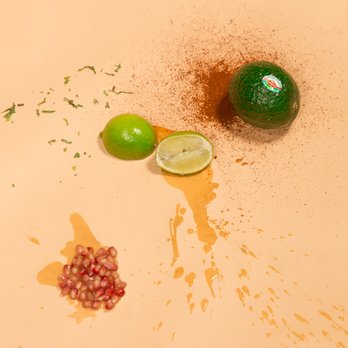 Colibri - a lime, pomegranate, and seeds - Mexican Near Me - Toronto, Ontario
