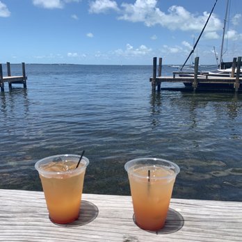 Caribbean Club - Outside area limited seating but the view very nice - Dive Bars Near Me - Key Largo, Florida Caribbean Club - Outside area limited seating but the view very nice - Dive Bars Near Me - Key Largo, Florida