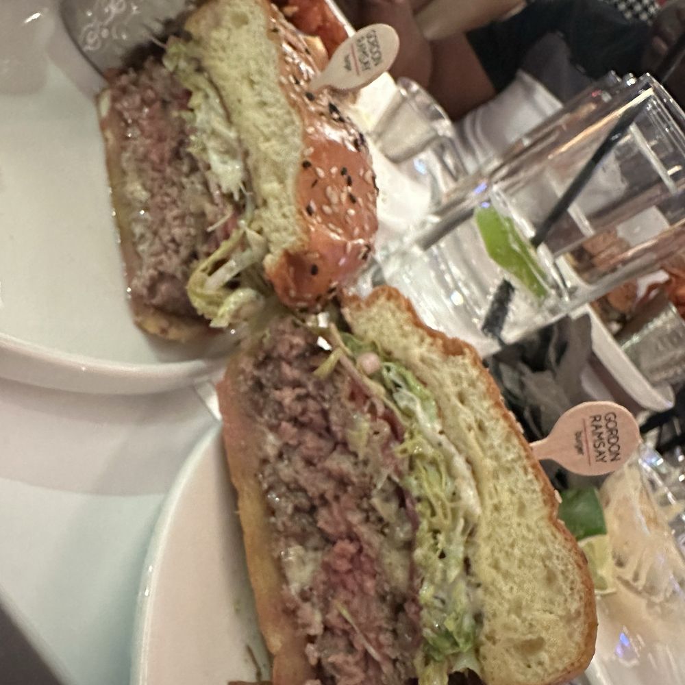 Truffle Burger ($24.50), Sweet Potato Fries ($2) Truffle Burger ($24.50), Sweet Potato Fries ($2)