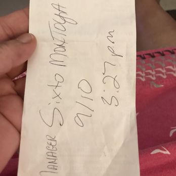 Chicken Express - a person holding a piece of paper - Chicken Shop Near Me - El Campo, Texas