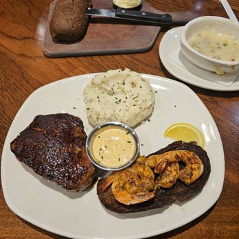 Outback Steakhouse - 9oz sirloin with shrimp and mashed potatoes - Steakhouses Near Me - Colorado Springs, Colorado Outback Steakhouse - 9oz sirloin with shrimp and mashed potatoes - Steakhouses Near Me - Colorado Springs, Colorado