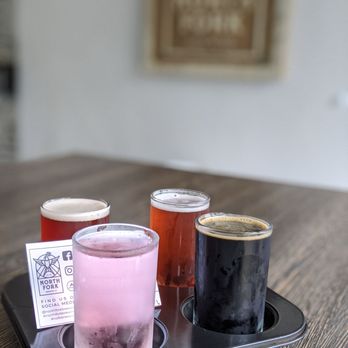 North Fork Brewing - three different beers on a tray - Breweries Near Me - Riverhead, New York