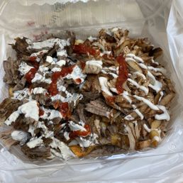 Shawerma Over Fries (half beef, half chicken) Shawerma Over Fries (half beef, half chicken)