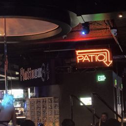 the patio sign and a dancer
