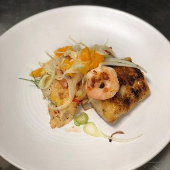 Sway - Corvina filet on a 3 pepper grit cake with fennel slaw - Southern Near Me - Louisville, Kentucky Sway - Corvina filet on a 3 pepper grit cake with fennel slaw - Southern Near Me - Louisville, Kentucky