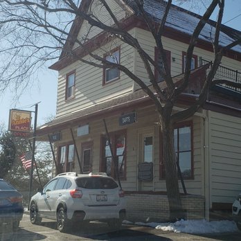 Annie's Place - cars parked in front of a house - Bars Near Me - Hales Corners, Wisconsin