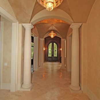 Agape Remodeling - a hallway with a chandelier - Flooring Near Me - Marietta, Georgia Agape Remodeling - a hallway with a chandelier - Flooring Near Me - Marietta, Georgia