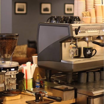 Kalona Coffee House - a coffee machine and coffee cups - Juice Bars & Smoothies Near Me - Kalona, Iowa Kalona Coffee House - a coffee machine and coffee cups - Juice Bars & Smoothies Near Me - Kalona, Iowa