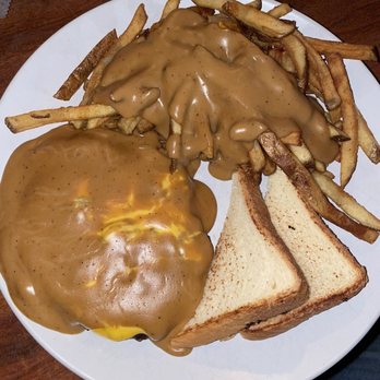 The Local Uptown - a plate of food with gravy and french fries - Bars Near Me - Anderson, South Carolina The Local Uptown - a plate of food with gravy and french fries - Bars Near Me - Anderson, South Carolina