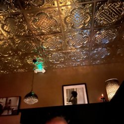 Better Than Sex - A Dessert Restaurant - Ceiling tile and chandeliers all throughout.