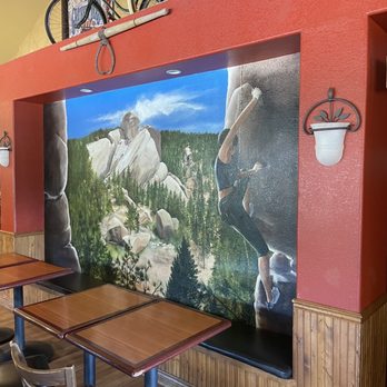 Zokas Restaurant & Bar - Rick climbing mural - New American Near Me - Pine, Colorado Zokas Restaurant & Bar - Rick climbing mural - New American Near Me - Pine, Colorado