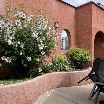 Arlington Bar & Grill - a patio with a table and chairs - Bars Near Me - Trail, British Columbia Arlington Bar & Grill - a patio with a table and chairs - Bars Near Me - Trail, British Columbia